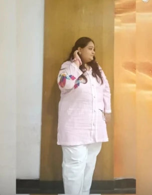Divya Patel wearing Soft Pink Embroidered Kurti in 3XL